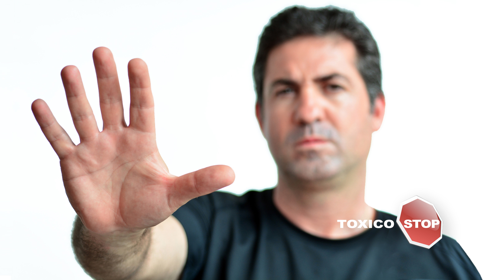 man making a stop gesture with his hand